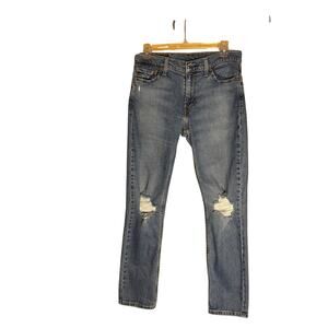 Levis Mens 511 Distressed Jeans in Medium Light Wash. Size 30" x 30".
